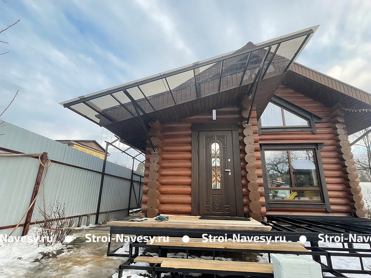 Навес из монолитного поликарбоната односкатный в стиле хай-тек крыльцо к дому Навес из монолитного поликарбоната односкатный в стиле хай-тек крыльцо к дому